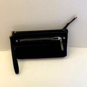 Brown Dana Buchman wristlet. 4 x 8 x 1 inches. Almost new.  Excellent condition